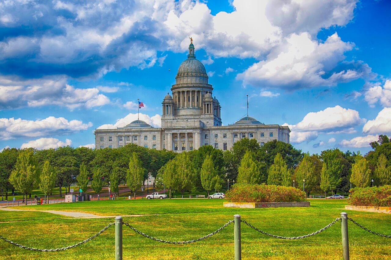 RI statehouse in Providence|Building and lighthouse on Rhode Island’s coast
