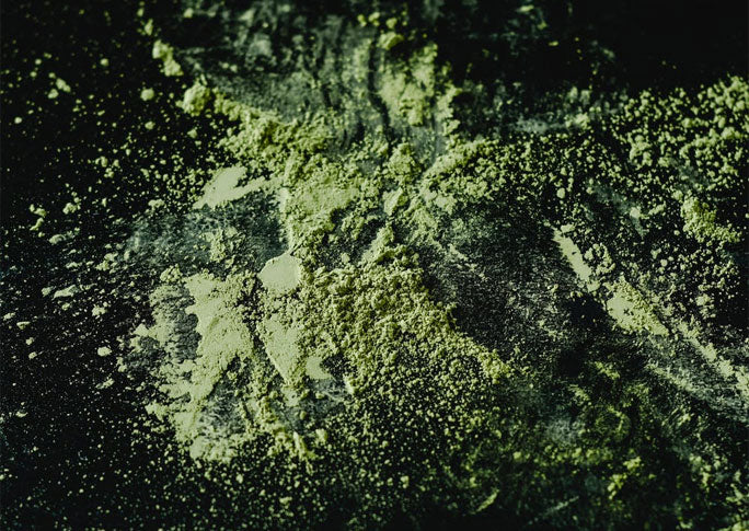 Close up of kratom powder|Close up of kratom powder