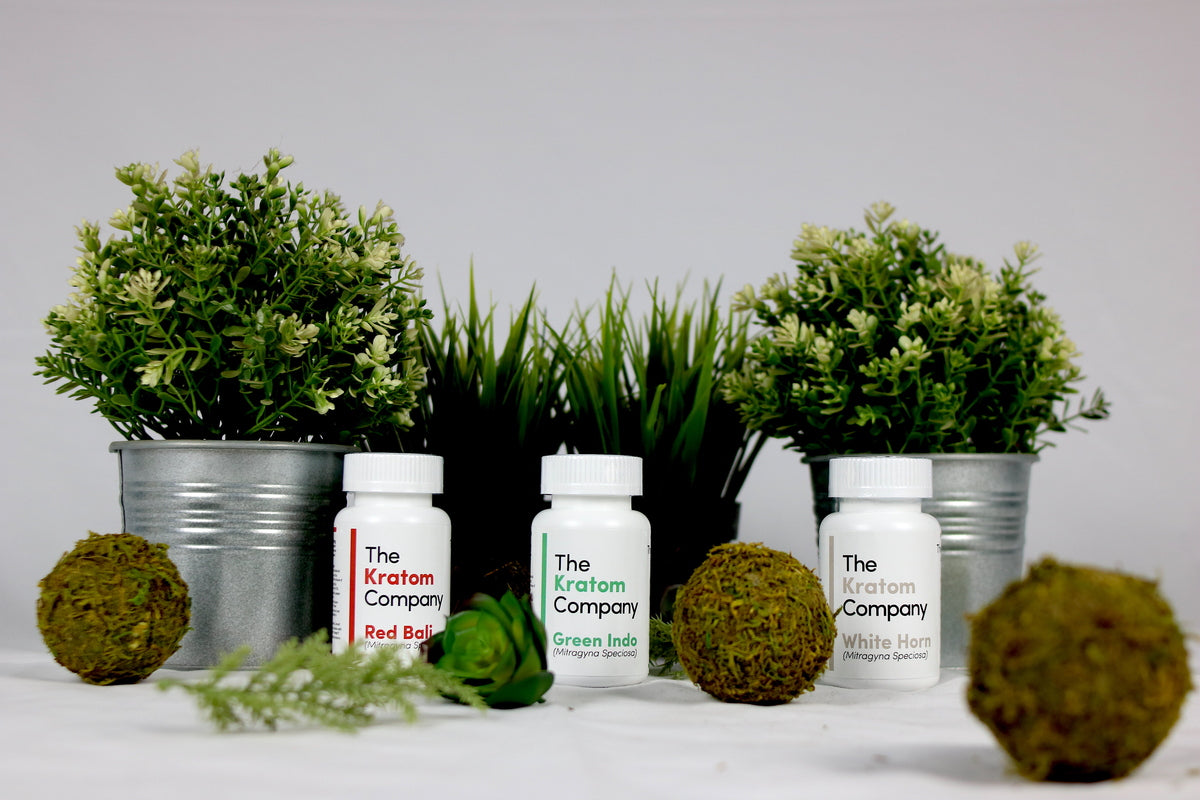 Red, green, and white kratom products from The Kratom Company