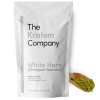 A packet of white Horn kratom powder, with some powder on a wooden vessel.