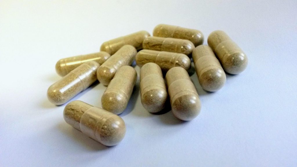 brown herbal capsules