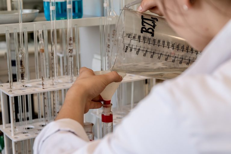 Woman in a lab with diagnostic equipment