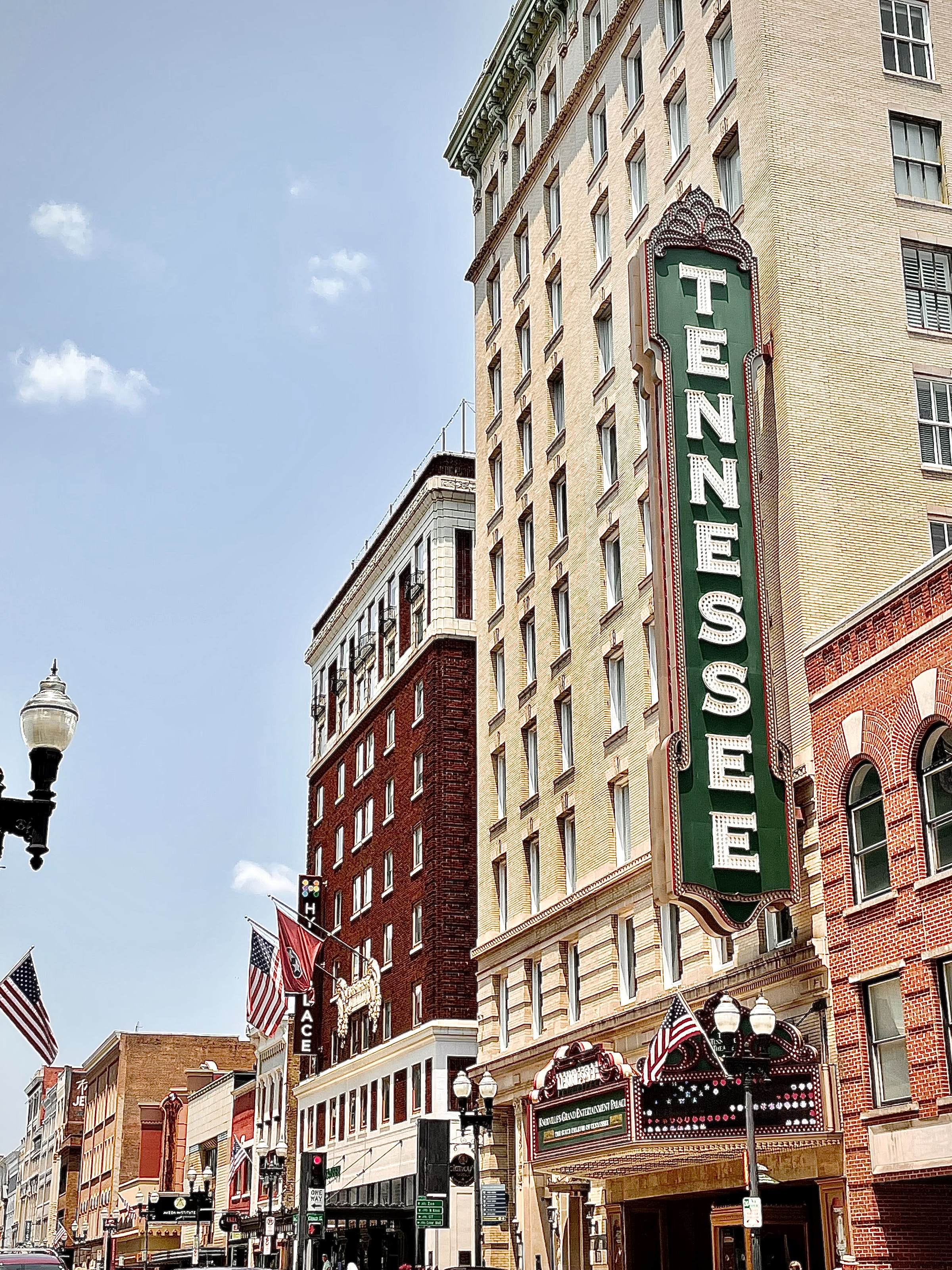 Concrete urban building with green Tennessee sign