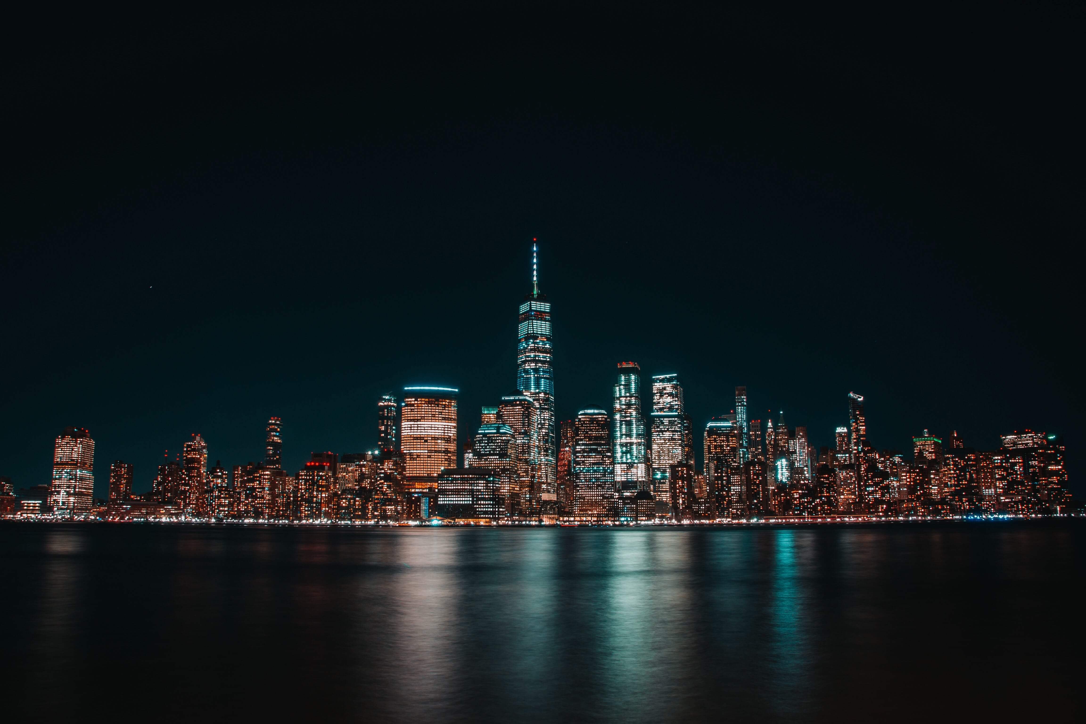 illuminated cityscape of Jersey City at night