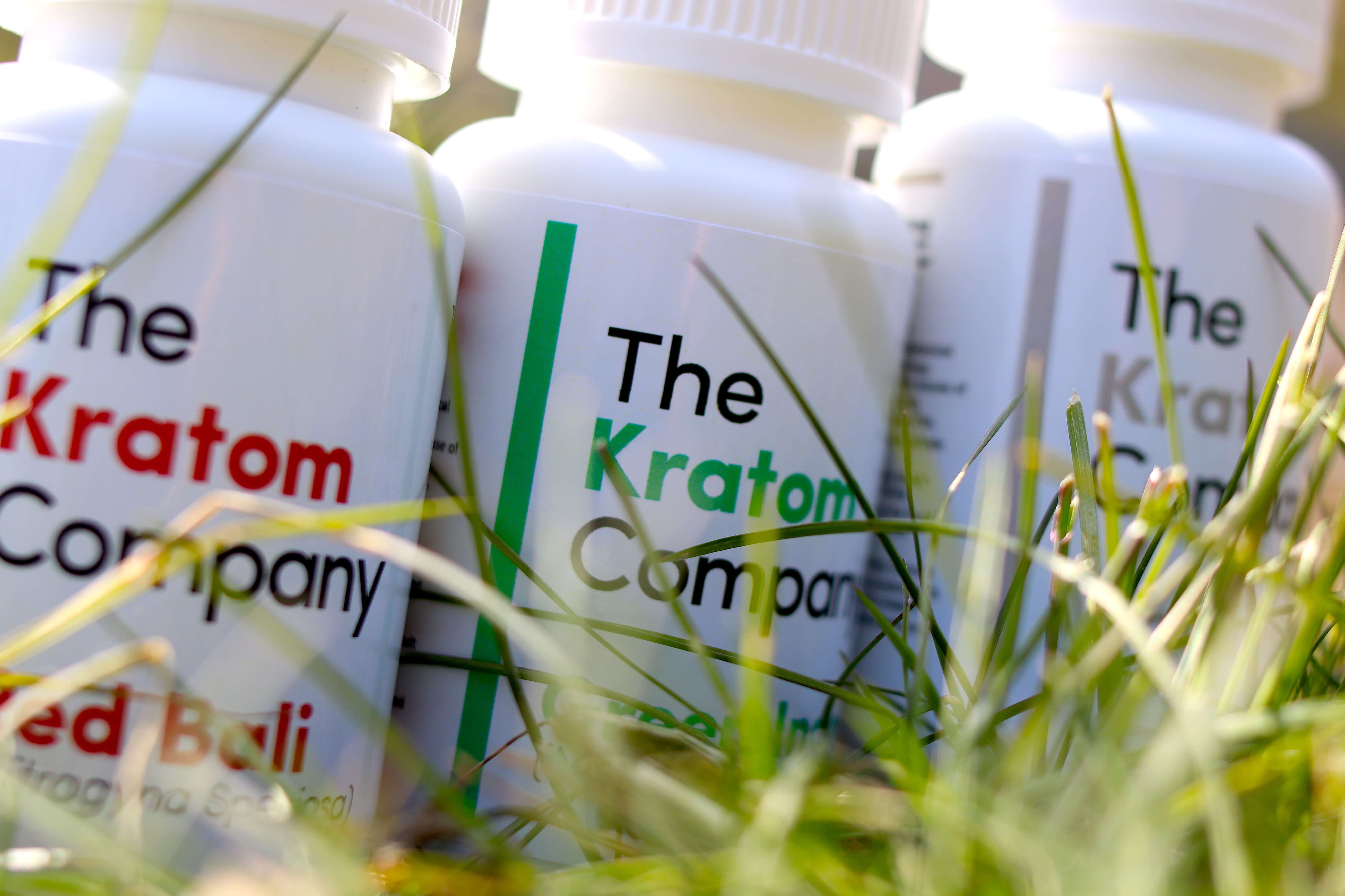 Three kratom bottles lined up